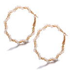 Pearls wrapped around ear rings